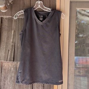 Calvin Klein performance quick dry tank to with cutout design on back. Medium